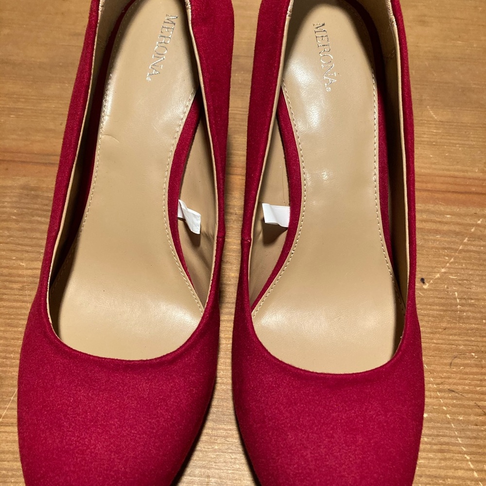 Red suede pumps